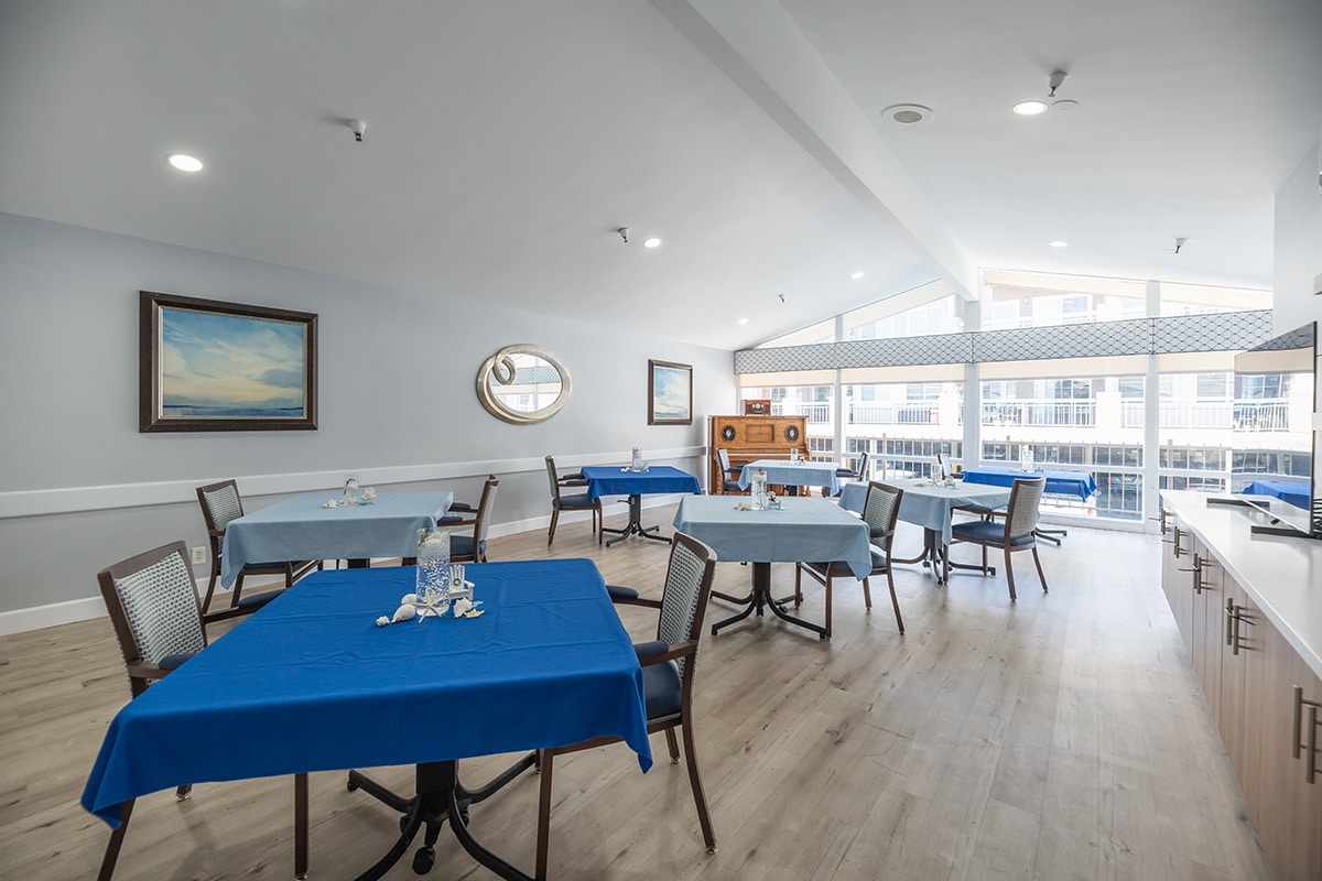 Dining room with tables with blue cloths