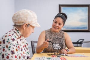 Two women playing bingo