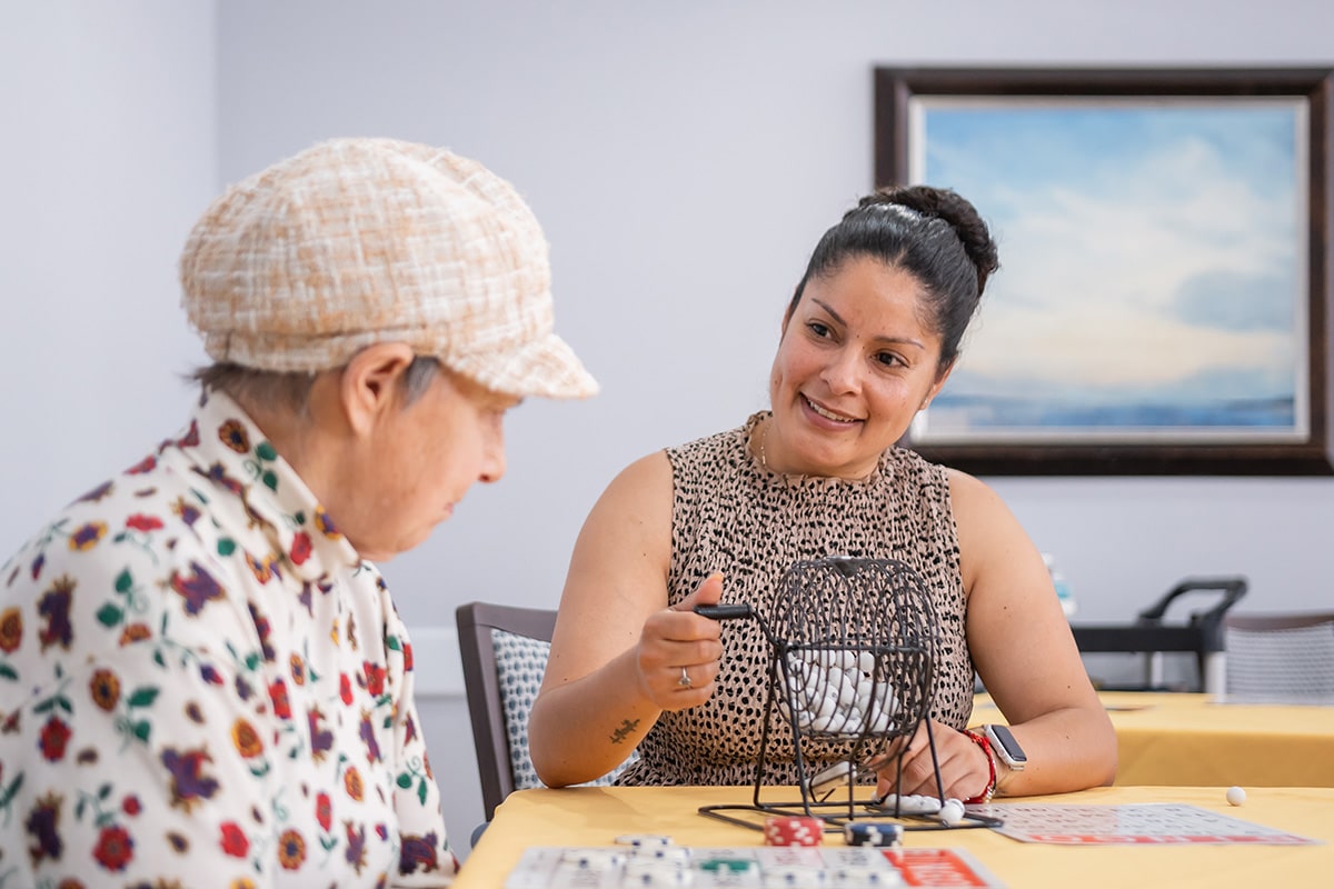 Two women playing bingo